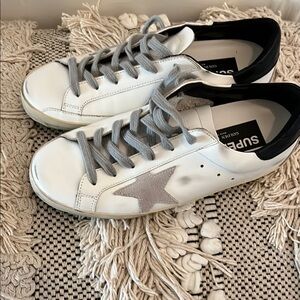 Golden Goose Sneakers, worn once. Size 37 women’s . White with grey suede star.